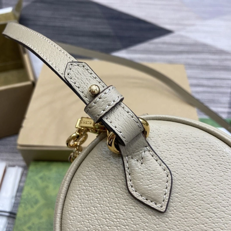Refined Gxccx Round Bags 38021