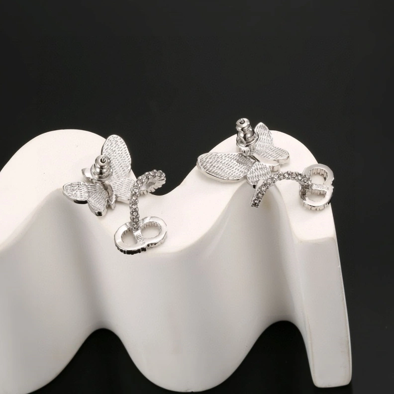 Classic Christian Dxxr Earrings 294583