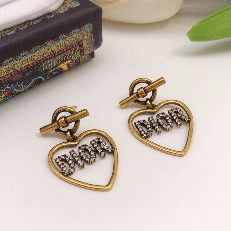 Christian Dxxr Earrings Elegant 293971