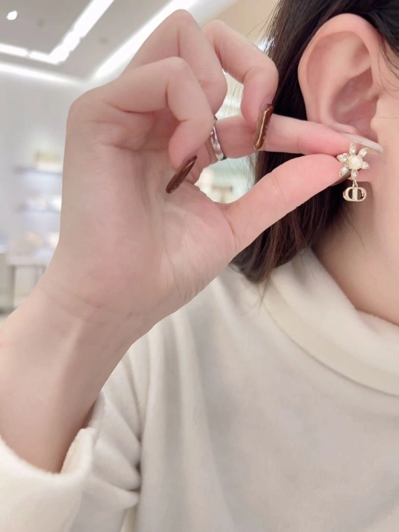Trendsetting Christian Dxxr Earrings 293957