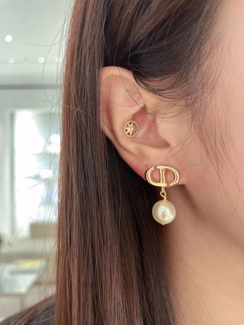 Compact Christian Dxxr Earrings 294434