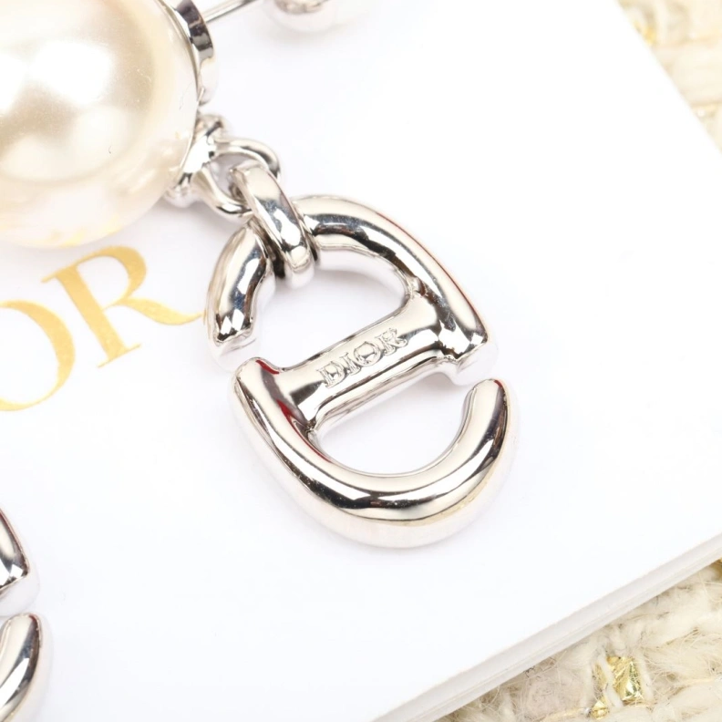 Christian Dxxr Earrings Compact 294192